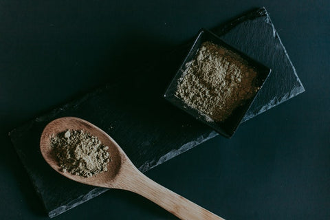 Wooden Spoon on Black Wooden Table