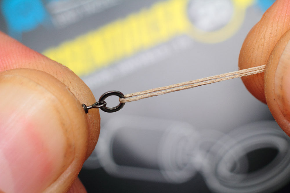 Feed one of our Micro hook ring swivels onto the double over braid