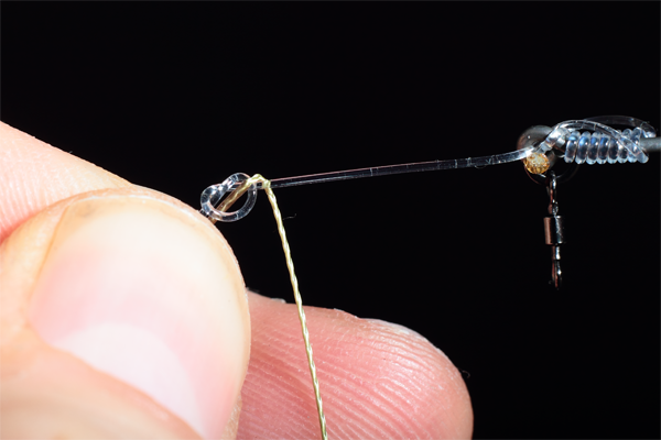 Start to whip the bare section of braid up the Chod filament going clockwise