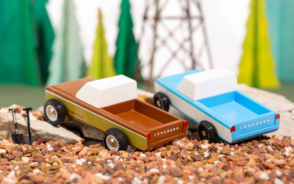 two candylab wooden toy pickup trucks