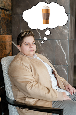 dapper boi model sitting on chair, dreaming of delicious PSL