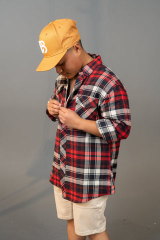 DB Model layered up in flannel and shorts