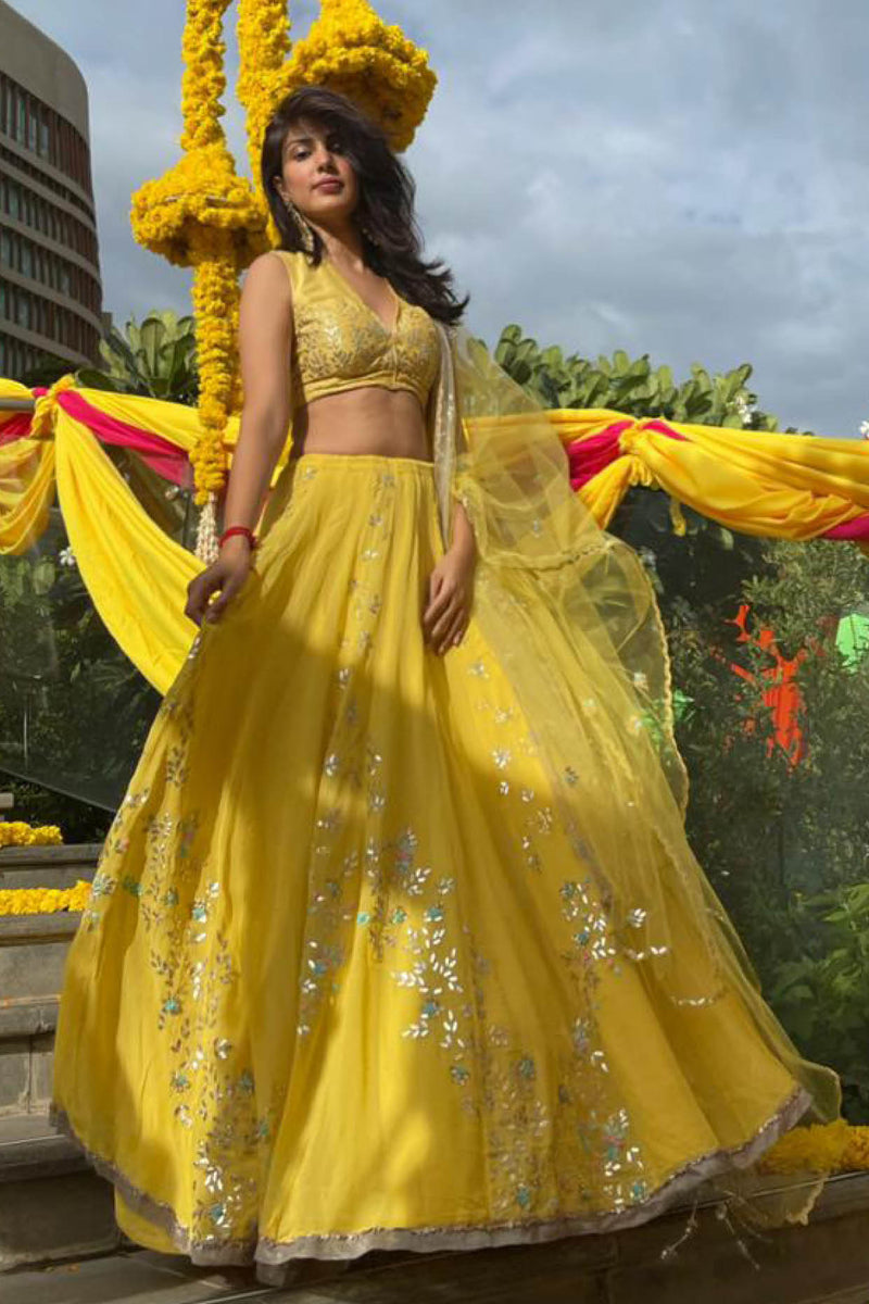 Devnaagri - Rhea Chakraborty In Lemon Georgette Lehenga with Raw Silk Blouse