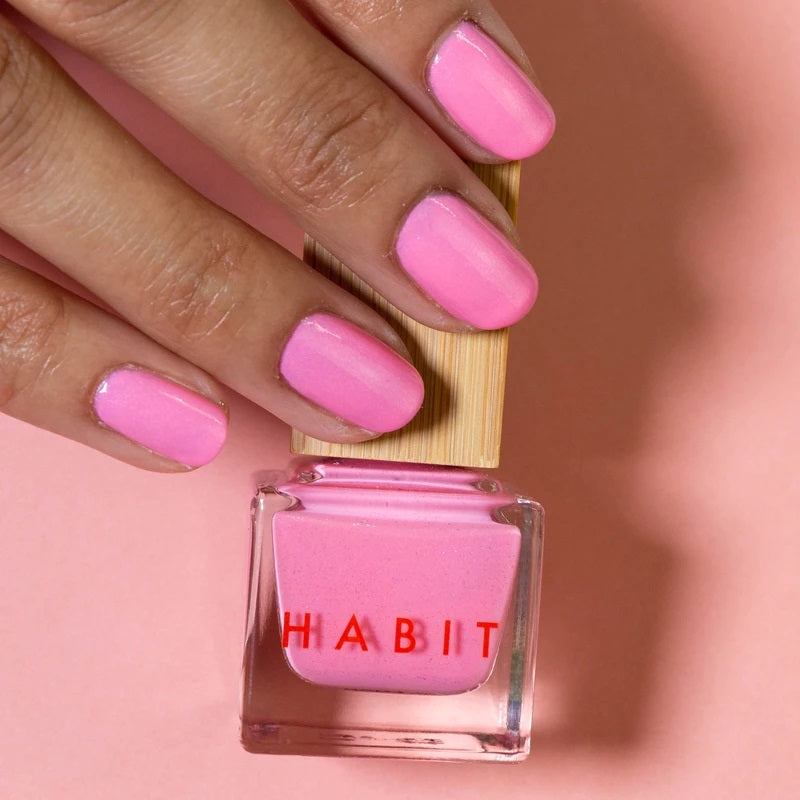 Bright pink coloured nails. The nail polish is from Habit Cosmetics and the color is one of their new Sprin/Summer 2021 colors.