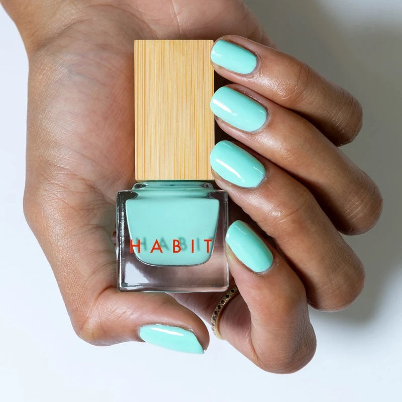 Bright light turqouise coloured nails. The nail polish is from Habit Cosmetics and the color is one of their new Sprin/Summer 2021 colors.