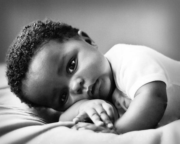 Wholesome baby resting on linen - Wholesome Linen Blog