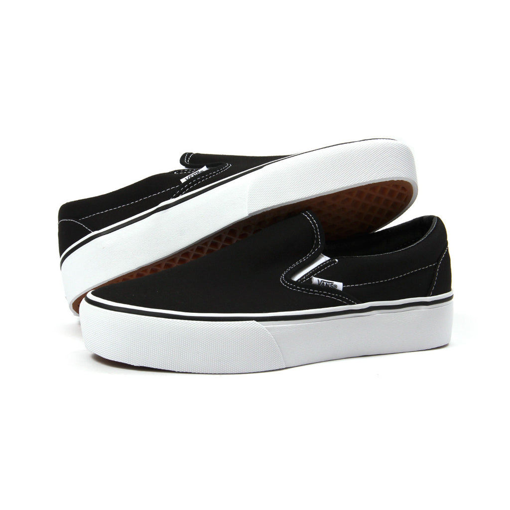 ladies black slip on vans