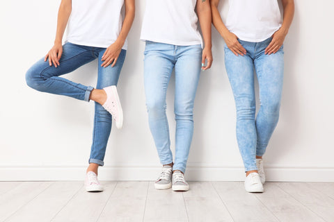 different variations of women wearing different denim