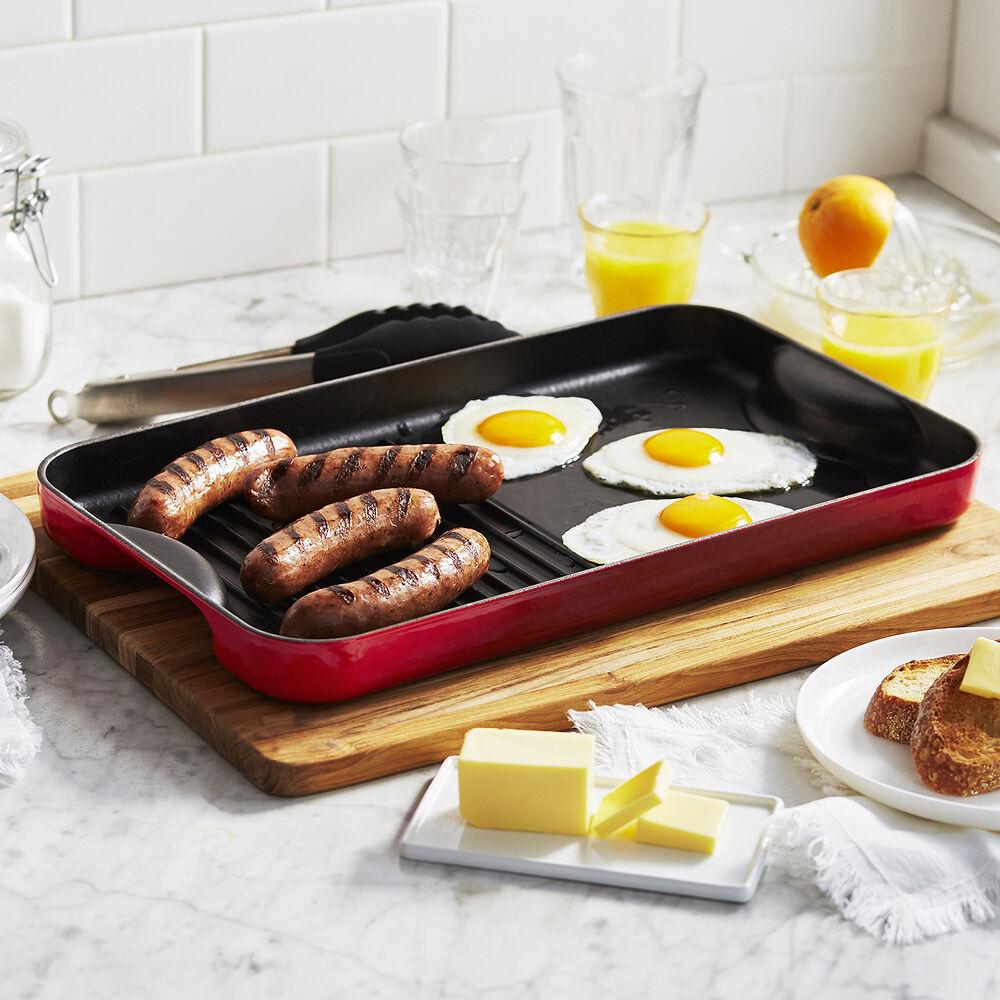 https://cdn.shopify.com/s/files/1/0877/8040/products/le-creuset-cast-iron-grill-and-griddle-cerise-711408.jpg?v=1632286060&width=1000