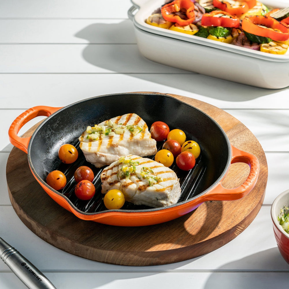 https://cdn.shopify.com/s/files/1/0877/8040/products/le-creuset-le-creuset-signature-cast-iron-975-25cm-round-grill-pan-ls2020-2567-320930.jpg?v=1654807349&width=1000