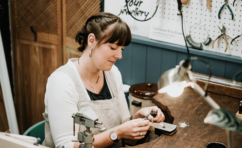 Corrinne Eira Evans working on her rings in her workshop