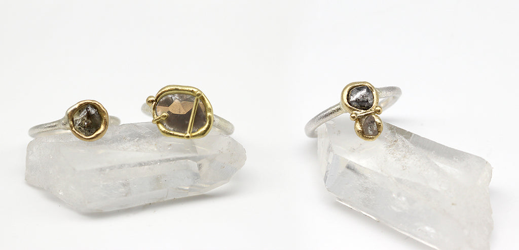 Tamara Gomez Three rings with raw diamonds, diamond slices in silver and yellow gold