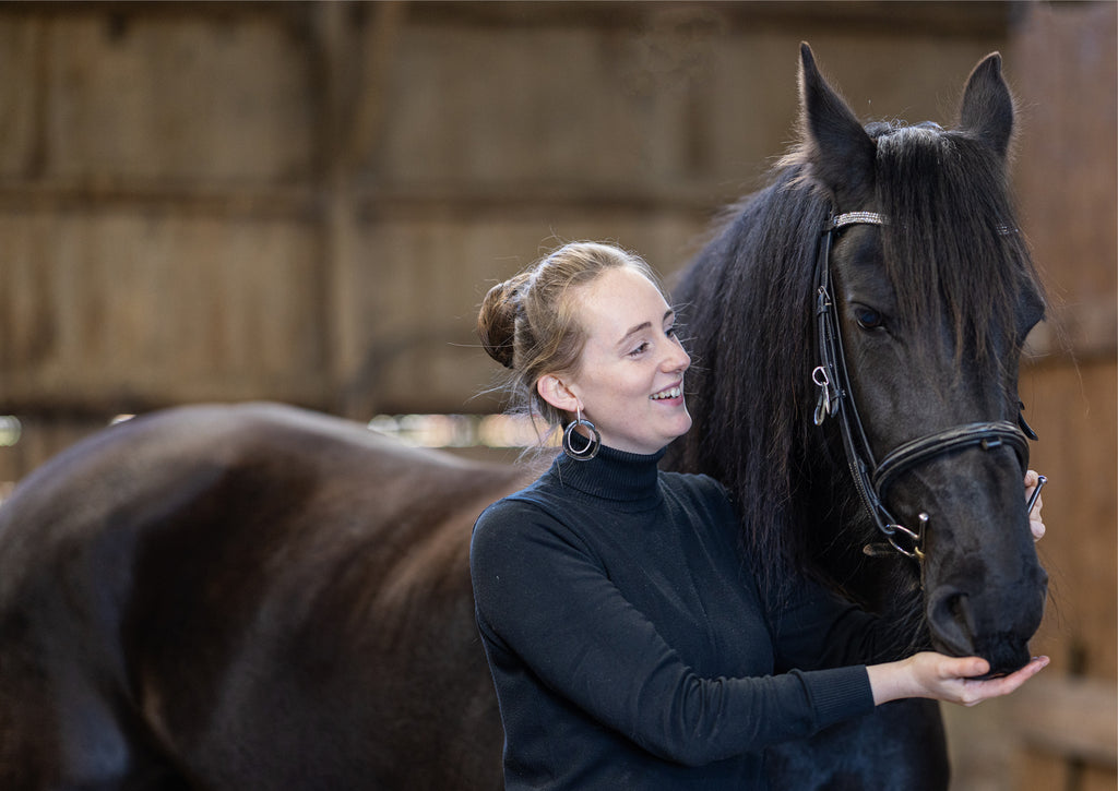 Rachel Adam with her horse Monca, the main source of inspiration for the collection.