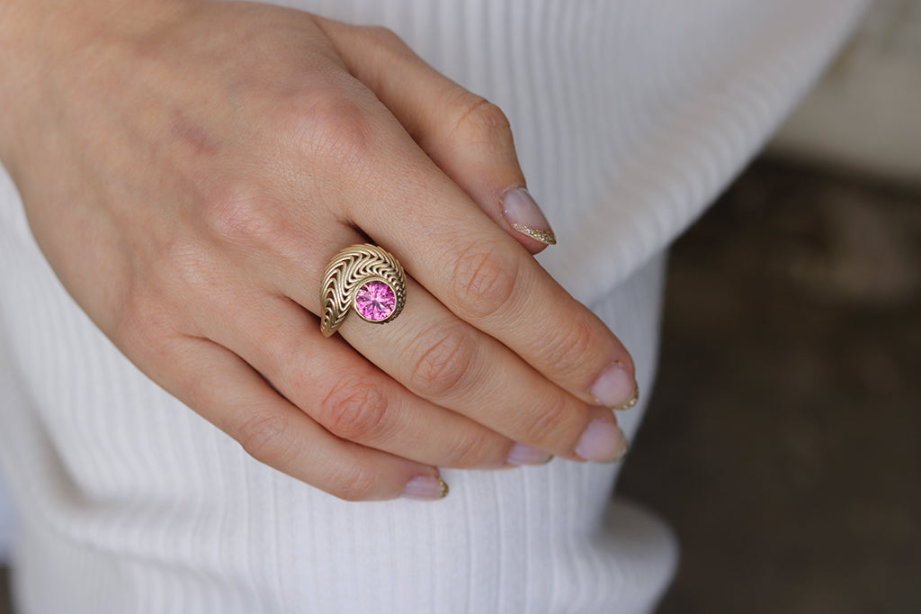 9ct yellow gold and pink tourmaline swirl ring by Lynna Maclachlan for Diana Porter Ring exhibtion