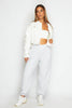 White Denim Cropped Distressed Hem Jacket