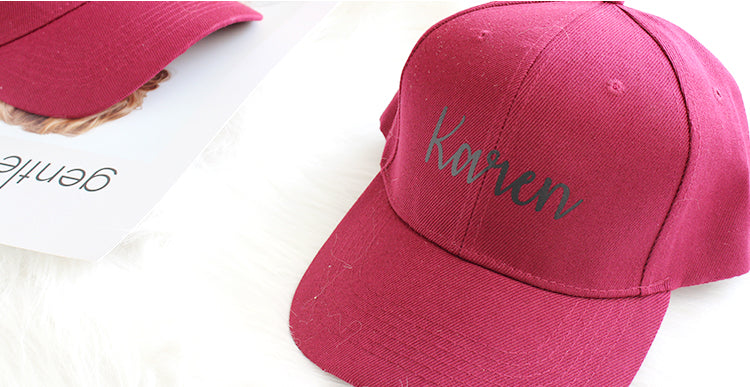 Close-up of Personalized Custom Baseball Caps in Red