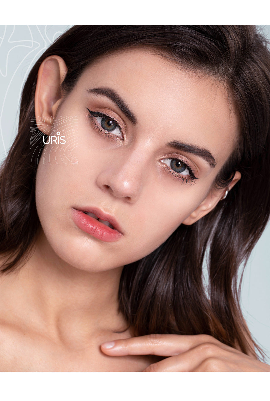 Close-up of Model wearing Uris Poppy Blue toric colored contacts for astigmatism