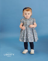 baby  in Liberty smock dress