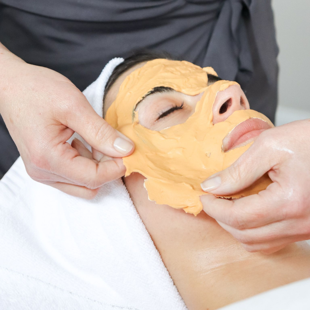 Woman Receiving a Facial Mask Treatment to Rejuvenate and Nourish Her Skin
