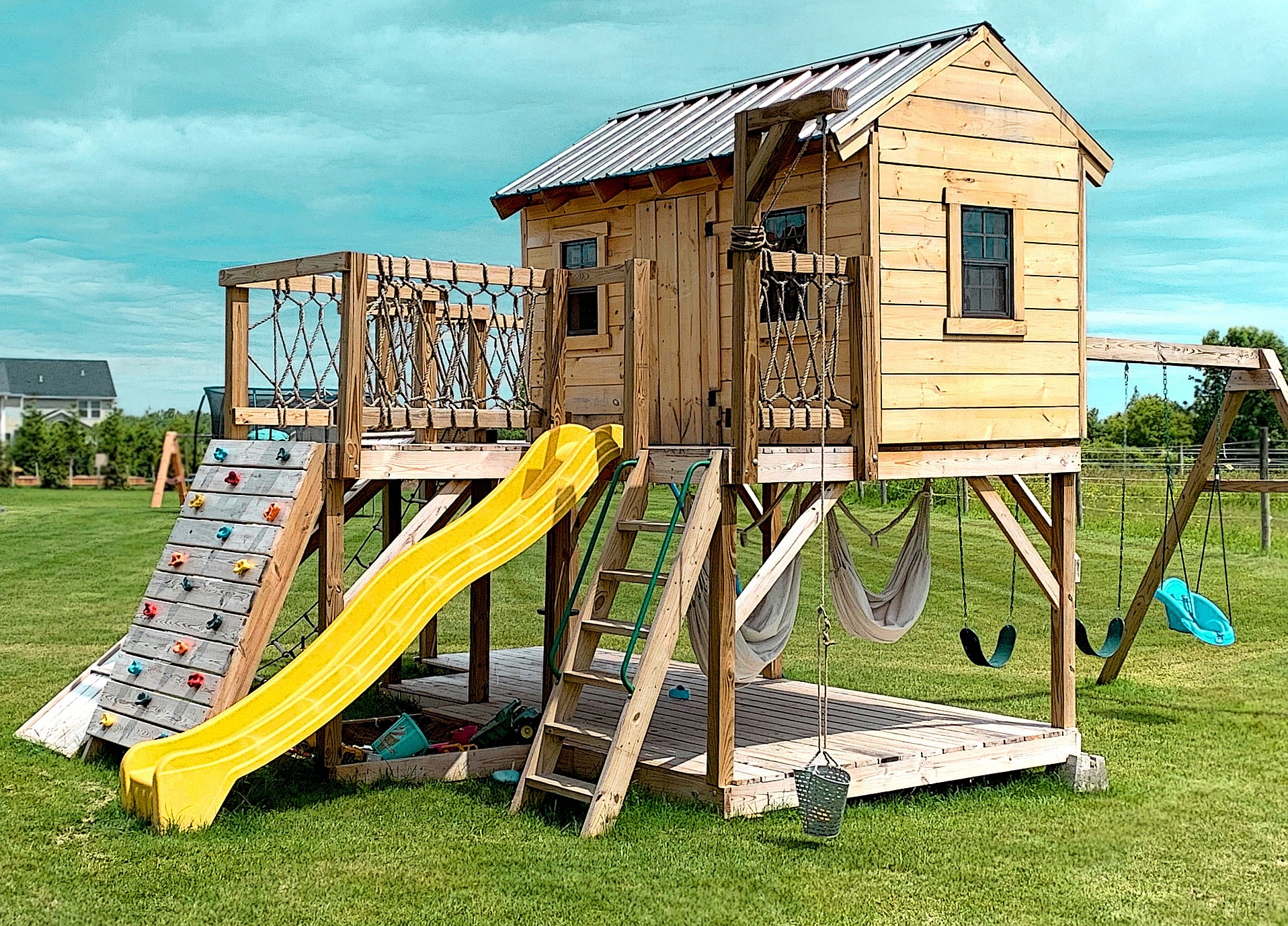 playhouse set with ladder slide and swings