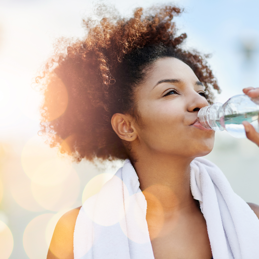 woman hydrating for better skin care