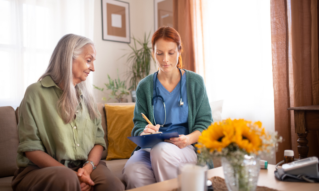 older woman speaking with doctor