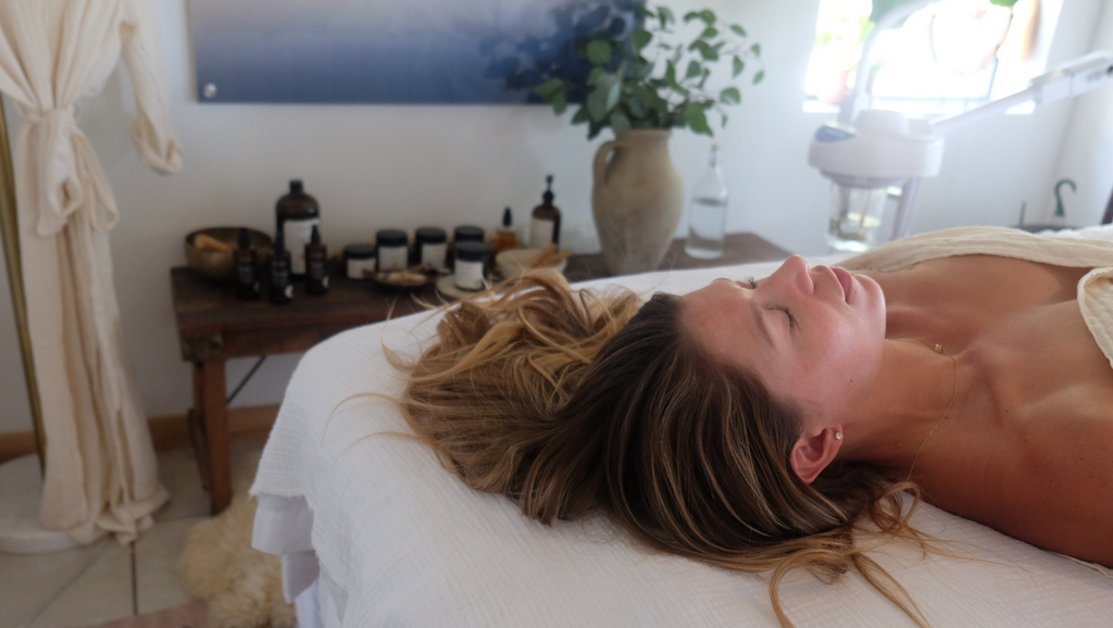 Jordan Jacobs client relaxes on a spa table