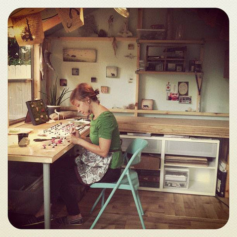 Faryn of Fernworks Jewerly working in her studio