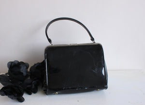 black patent leather satchel