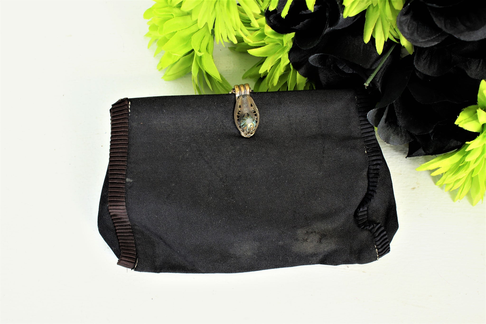 clutch bag with hand strap