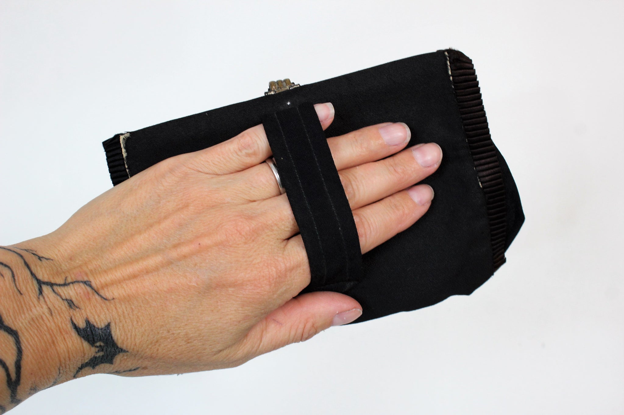 clutch with hand strap