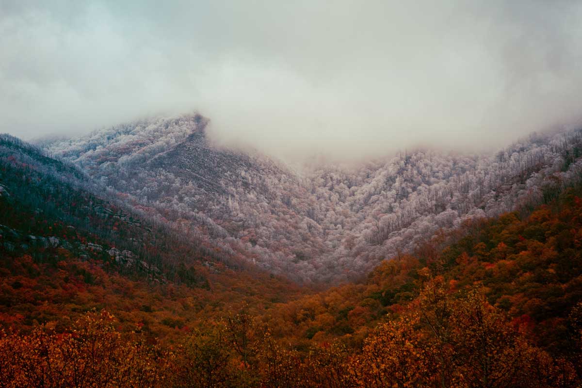 Colorful mountain view with a dusting on snow at Great Smoky Mountains National Park in winter.