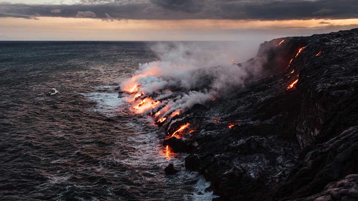 Lava flow hitting the ocean at Hawaii Volcanoes National Park.