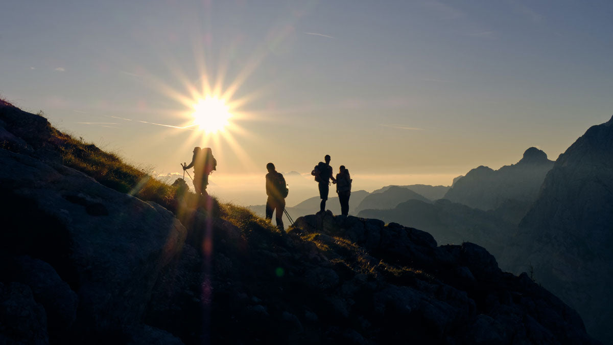 hikers watching the sunrise