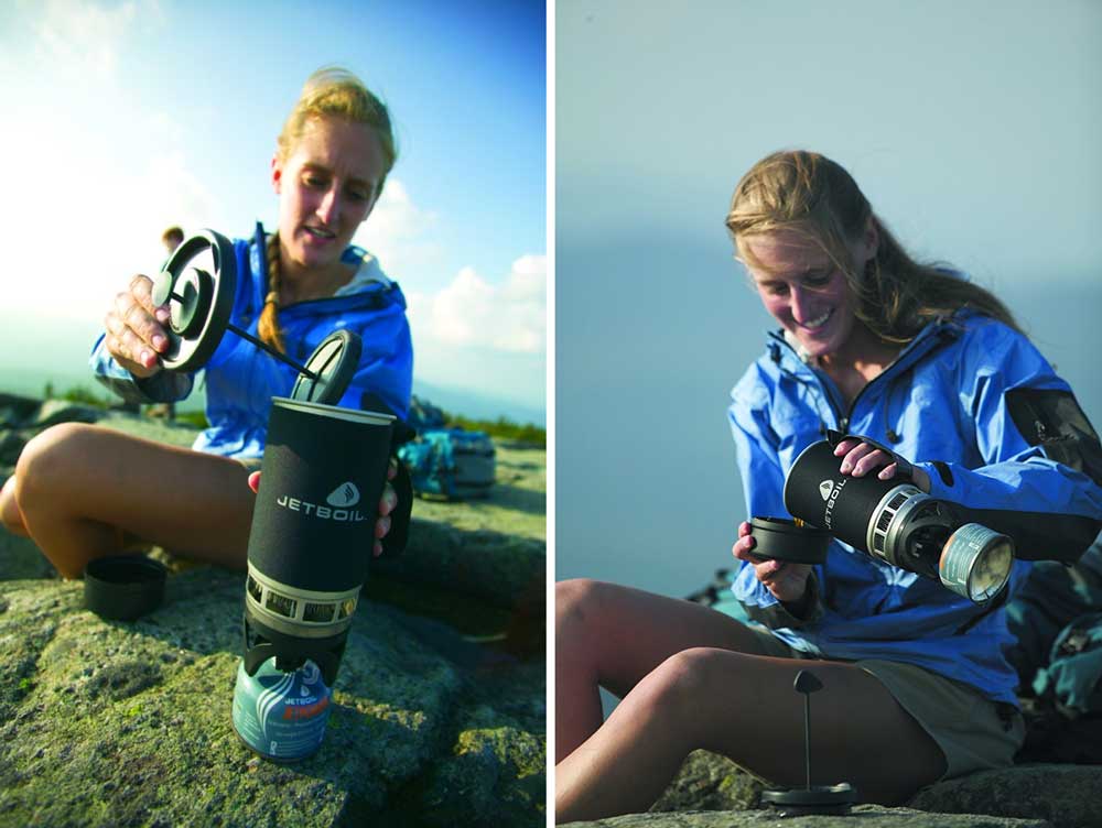 Women using a Jetboil coffee press to make coffee.