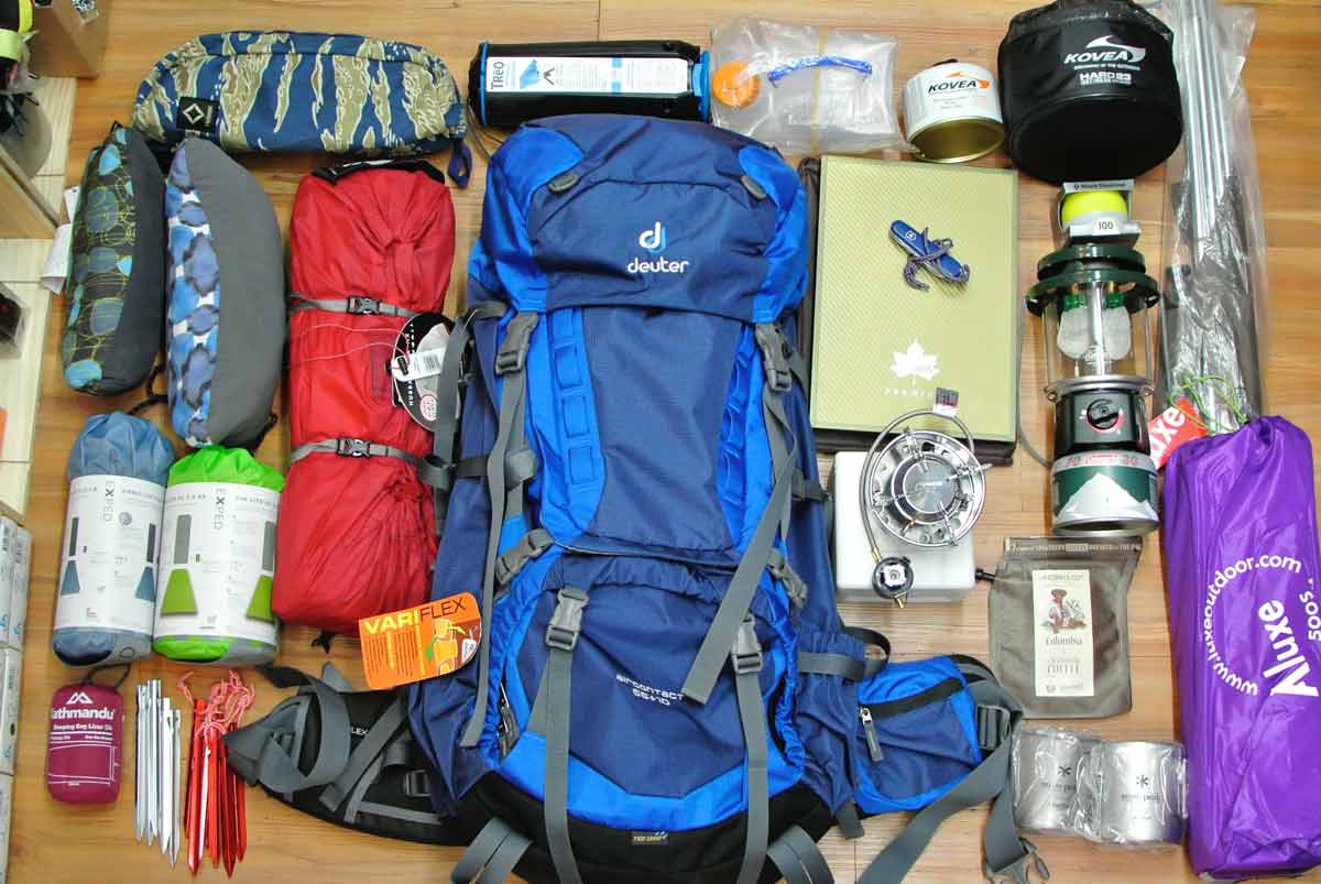 Camping gear laid out before backpacking trip