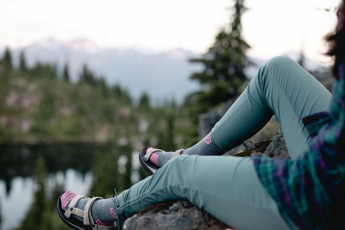 women hiker wearing merino wool socks