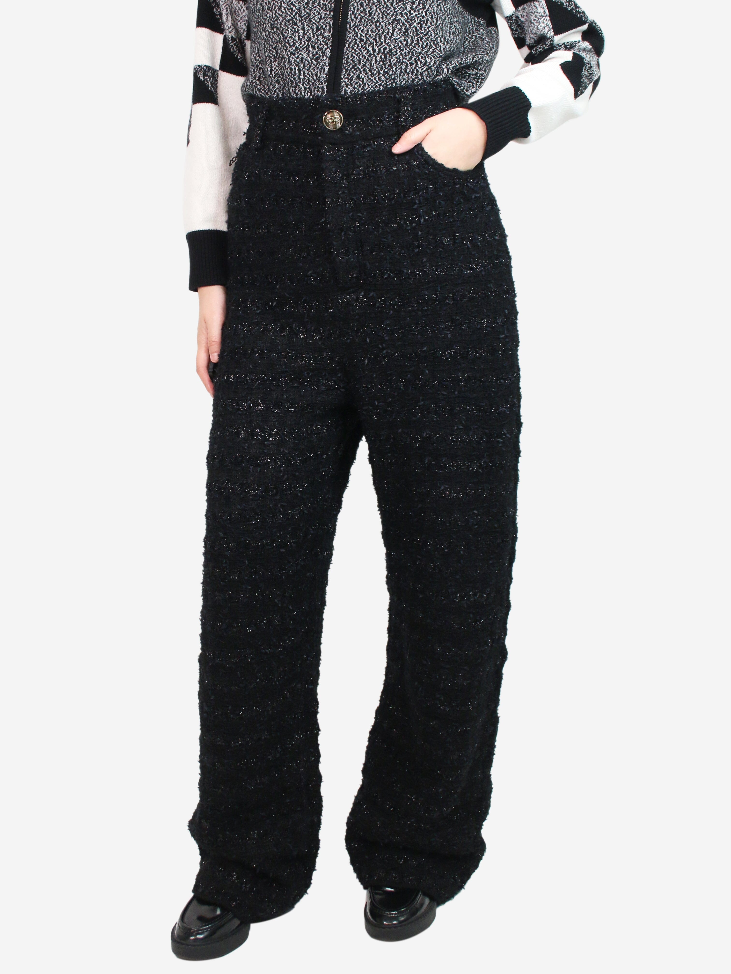 image of Black high-rise cut textured trousers - size M