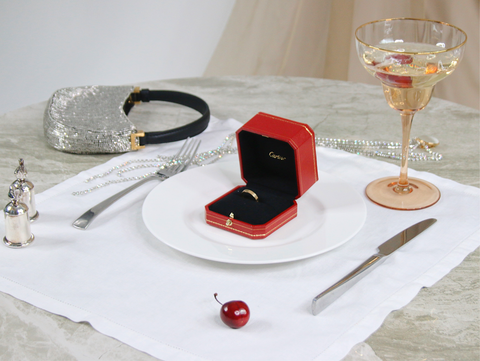 Cartier love ring on plate