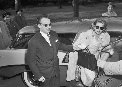 Grace Kelly holding Hermes Kelly bag 