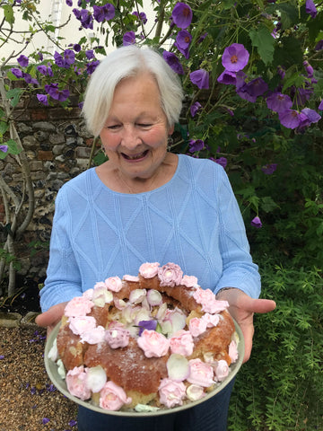 My mum with her homemade 80th birthday cake.