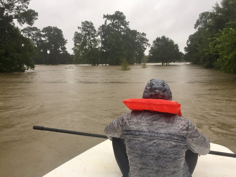 Derrest Williams, helping navigate the boat through neighborhoods 