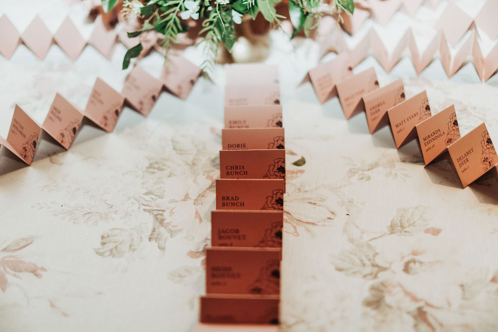 dusty pink escort cards vintage floral wedding