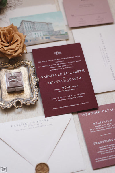 wedding invitation with white ink and burgundy paper