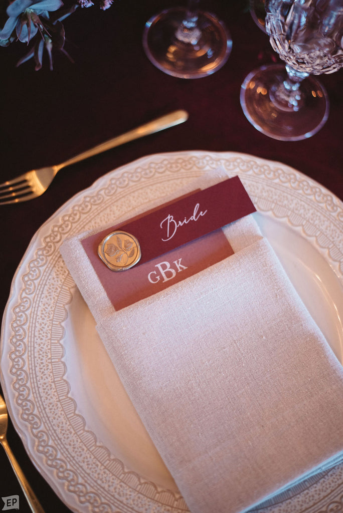 dusty pink wedding menus with gold wax seal