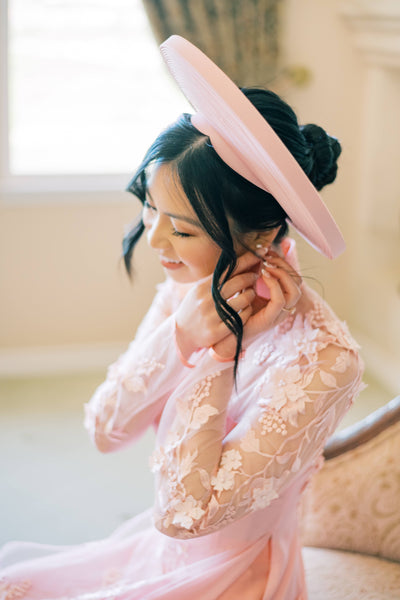 vietnamese bride getting ready in blush pink