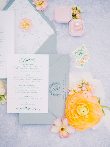 elegant formal traditional wedding invitation with sage green envelopes