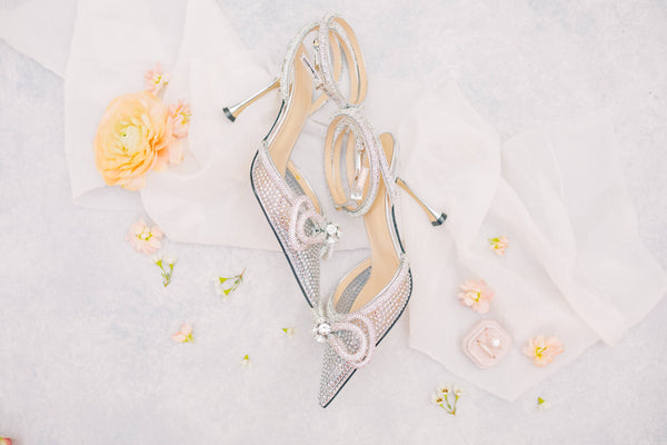 silver bridal shoes with bow