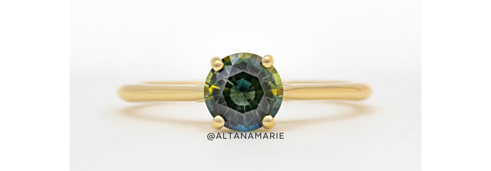 Parti sapphire engagement ring with a yellow and green sapphire and yellow gold band