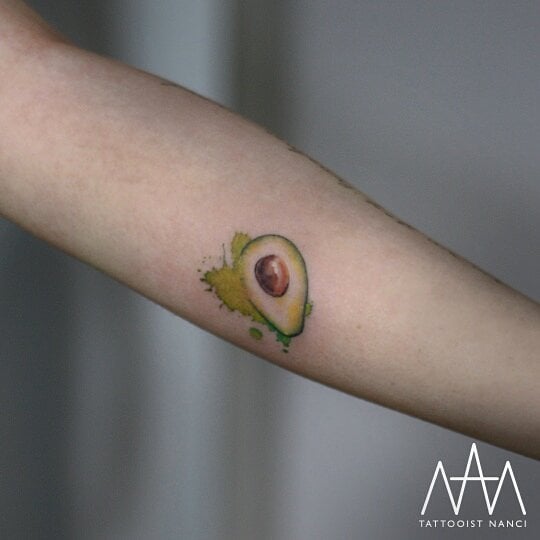 Half Avocado Tattoo by Tattooist Nanci